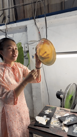 Traditional artwork displayed in Ho Chi Minh City workshop