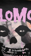 Black 'PLOMO' T-shirt with pierced person photo spotted Buenos Aires