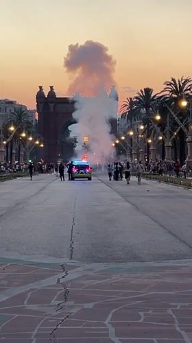 Midsummer bonfire night at Barcelona's Arc de Triomf