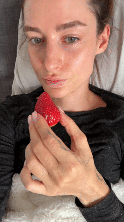 Woman resting on bedding observed in Kiel, Germany
