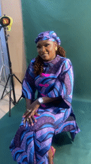 Woman conducts photo shoot in Nigerian studio