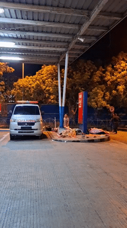 Nighttime scenes captured around Banda Aceh hospital emergency unit