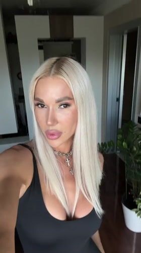 Woman takes selfie video indoors in Kazan, Russia