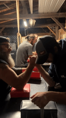 Late-night arm wrestling session held in Newburgh garage