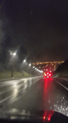 Heavy rain documented during nighttime drive in Tobolsk, Russia