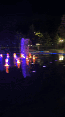 Colorful fountain light show illuminates Yerevan park at night