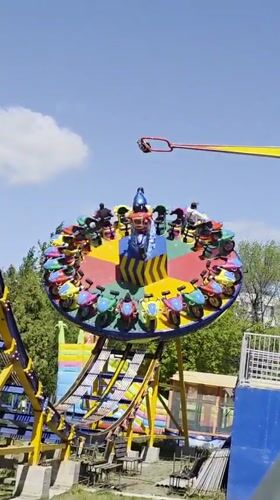 Family enjoys amusement park rides and photos in Ufa