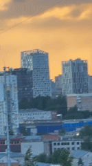 Witness documents Izhevsk cityscape from multiple elevated viewpoints during evening