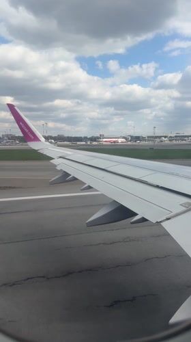 Traveler documents Warsaw airport journey, Wizz Air flight preparations