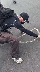 Protesters demonstrate outside Newark correctional facility with chalk art