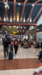 Mass group departure from Tangerang airport with luggage and buses