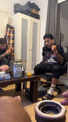 Evening social gathering captured in Barcelona apartment