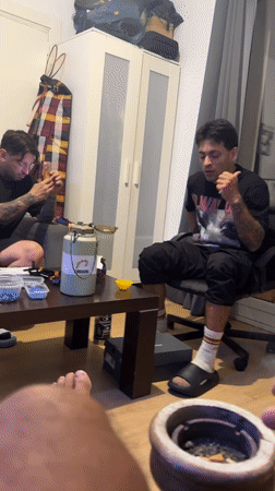 Evening social gathering captured in Barcelona apartment