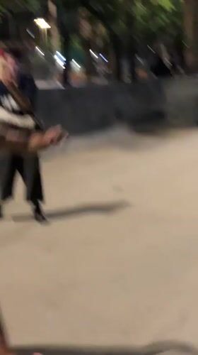 Man jumps into Barcelona harbor water at night