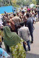 Police gather with crowd on Dhaka street
