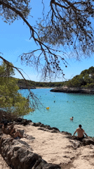 Sunny afternoon at a turquoise cove in Santanyí, Mallorca
