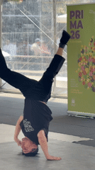 Breakdancers perform under tent in Santiago de Compostela