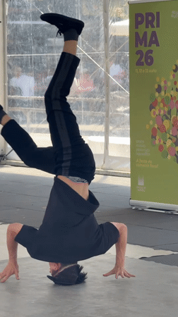 Breakdancers perform under tent in Santiago de Compostela