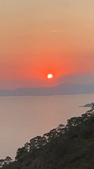 Sunset documented over Fethiye coastline during evening hours