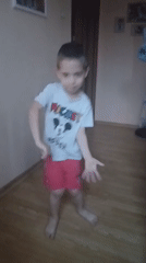 Children play and dance at home in Bulgarian village