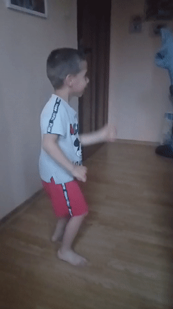 Children play and dance at home in Bulgarian village