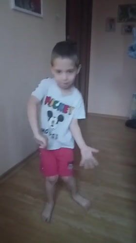 Children play and dance at home in Bulgarian village