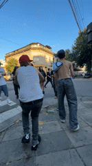 Young people gather for street performance in Buenos Aires