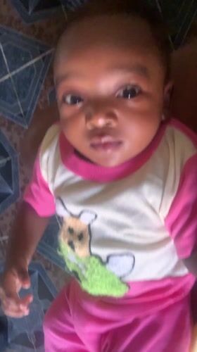 Baby in cartoon t-shirt photographed in Barakin Akawo, Nigeria