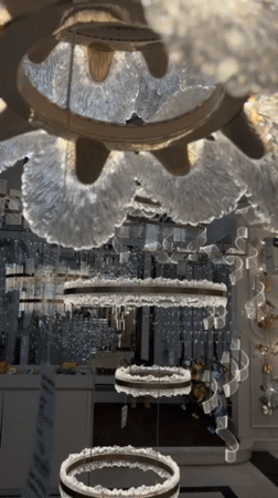 Dubai luxury décor showroom displays chandeliers, fountains, figurines