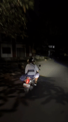 Night scooter ride captured in Ubud amid loud noise
