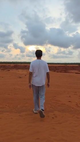 Couple visits Mui Ne Red Sand Dunes, Vietnam