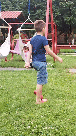 Kids and garden decor fill a Bucharest backyard on a summer morning