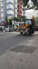 Backhoe blocks pedestrian crossing on Colombo street