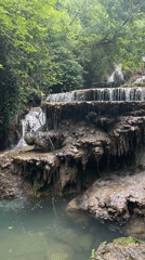 Krushuna Waterfalls tiered cascades through Bulgarian forest landscape