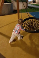 Child plays on Mumbai playground with balance bike