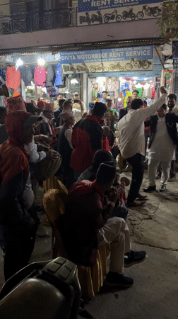 Traditional street celebration with music and dancing in Pokhara