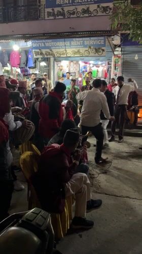Traditional street celebration with music and dancing in Pokhara