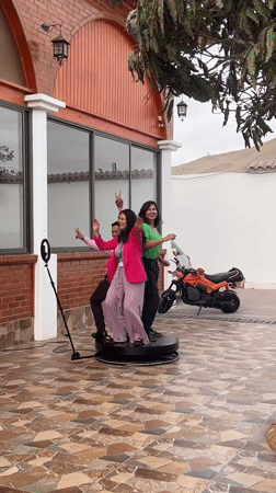 Party celebration with dancing, photo booth documented in Arica