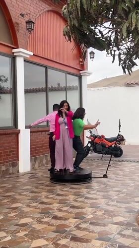Party celebration with dancing, photo booth documented in Arica