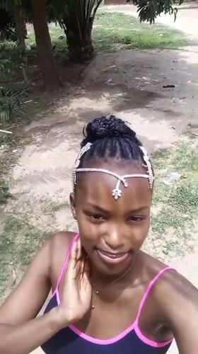 Woman documents traditional dress in selfie session, Keffi Nigeria