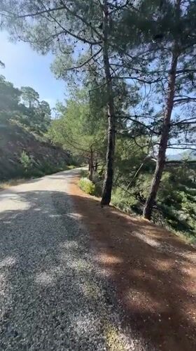 Woman captures scenic bay views during morning run in Fethiye