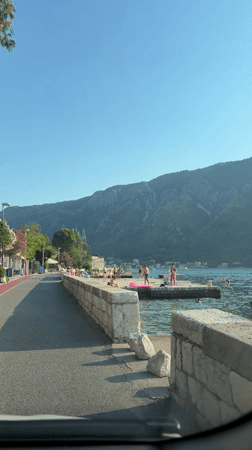 Cruising the coastal road through Dobrota on a sunny afternoon