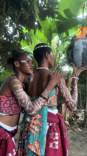Traditional ceremony with fire pots in Badagry Nigeria