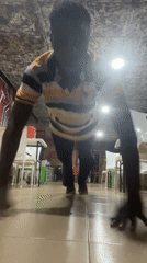Person exercises indoors in Obosi, Nigeria