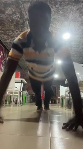 Person exercises indoors in Obosi, Nigeria