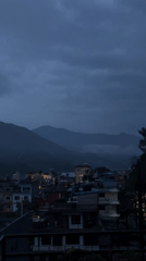 Twilight views of Pokhara cityscape captured under dramatic skies