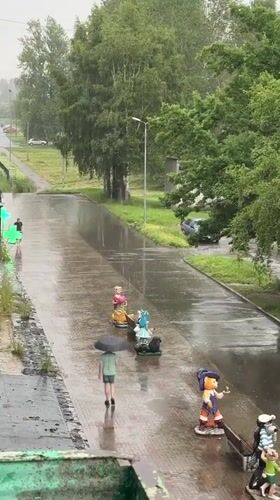 Heavy rain soaks the streets of Slantsy, Russia