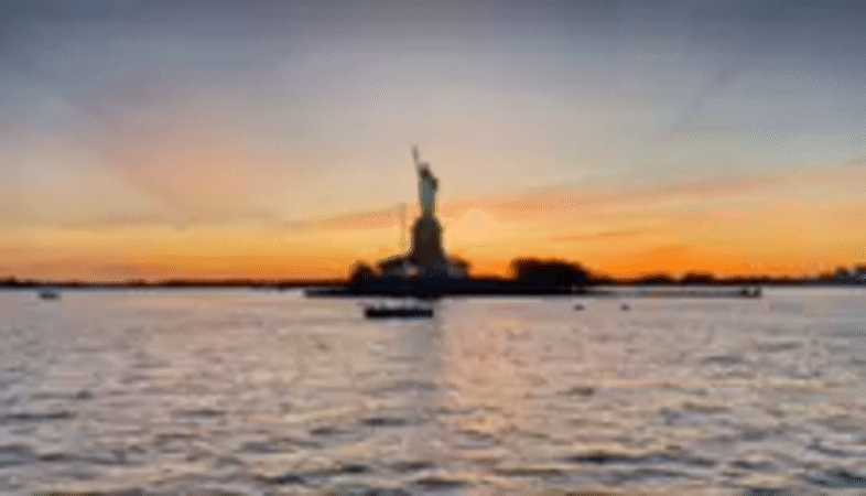 Statue of Liberty sunset view from Bayonne waters