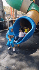 Busy morning at a Malang public park and surrounding streets