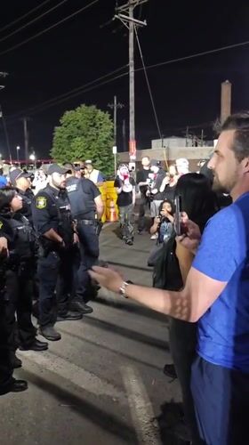 Nighttime police-civilian confrontation draws large crowd in Newark